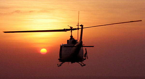 Helicopter into sunset